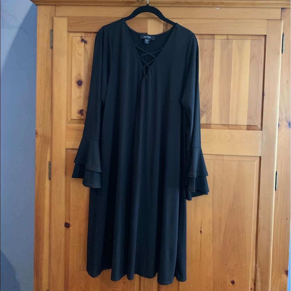 Black swing style lace up neckline dress.